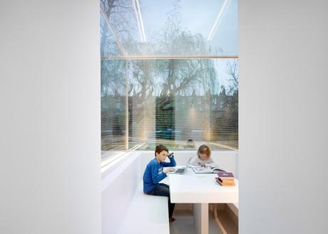 Extensión de vidrio integrada en la fachada Extensión de vidrio integrada en la fachada