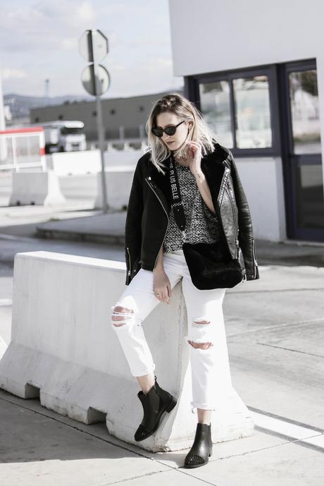 BLACK JACKET AND WHITE PANTS