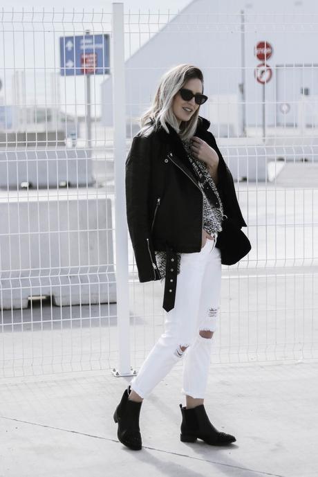 BLACK JACKET AND WHITE PANTS