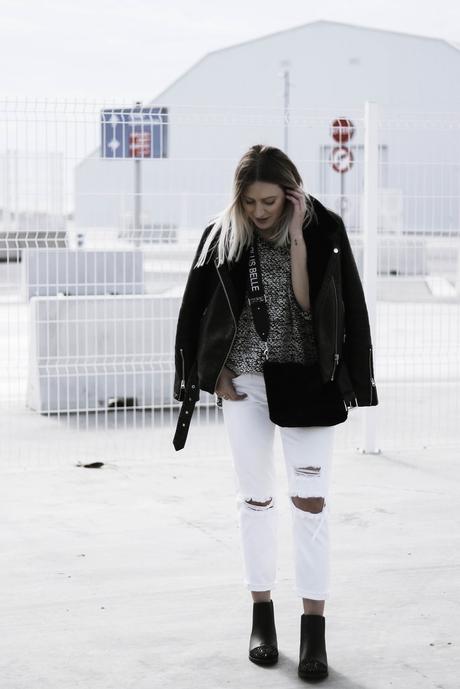 BLACK JACKET AND WHITE PANTS