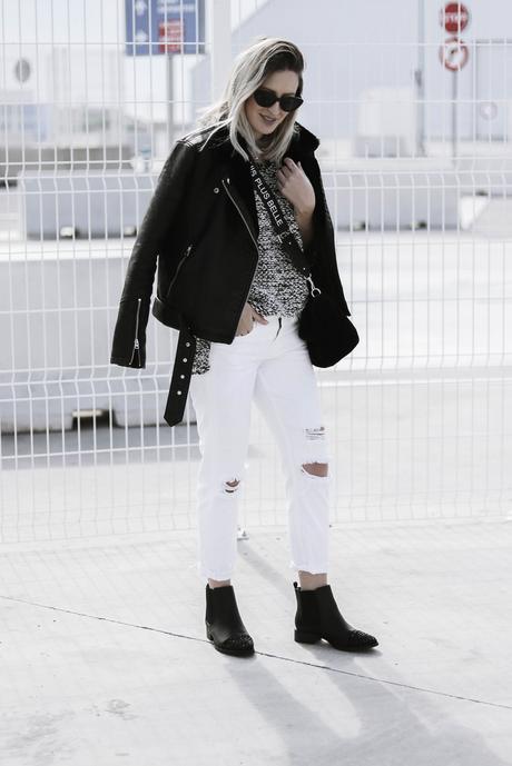 BLACK JACKET AND WHITE PANTS