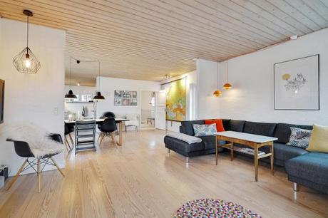 estilo escandinavo eames chair distribución abierta diseño interiores decoración sótano decoración nórdica comoda danesa casa danesa dos pisos casa con sótano 