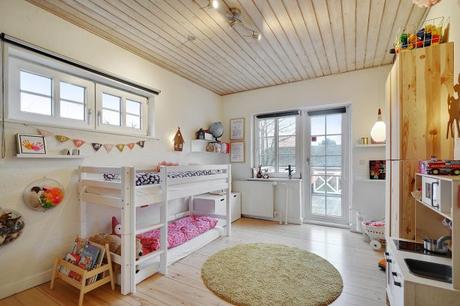 estilo escandinavo eames chair distribución abierta diseño interiores decoración sótano decoración nórdica comoda danesa casa danesa dos pisos casa con sótano 