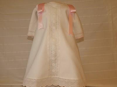 Batón blanco con jersey blanco y rosa