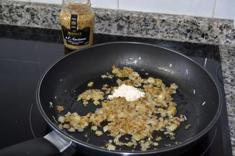 Lomo de cerdo en salsa de mandarina y mostaza a la antigua