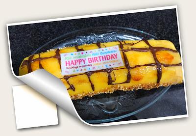 BRAZO DE GITANO DE YEMA QUEMADA Y NATA PARA CUMPLE DE MANOLO