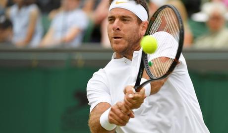 Tennis - Wimbledon - All England Lawn Tennis and Croquet Club, London, Britain - July 10, 2018. Argentinas Juan Martin Del Potro in action during the fourth round match against Frances Gilles Simon.  REUTERS/Toby Melville