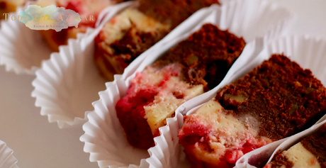 Brownie con cheescake y frambuesas
