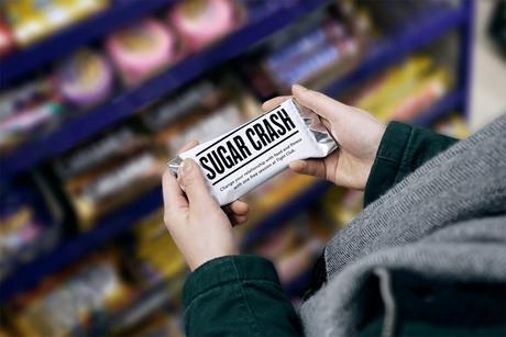 Envases de comida “basura” convertidos en invitaciones para el gimnasio