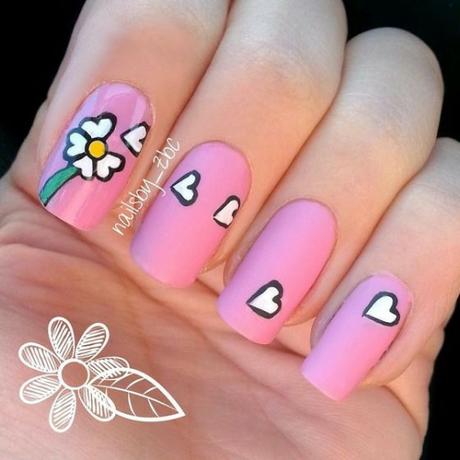 diseño de uñas rosa con flores