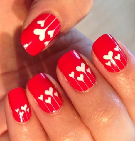 red nails with little hearts