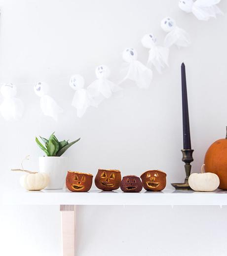 Velas de Halloween hechas con naranjas secas