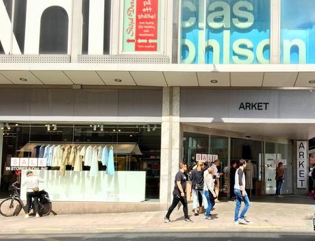 People Walk Past H M Owned Brand Arket S First In Stockholm