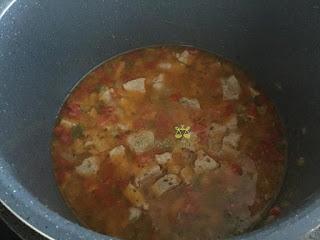 Carne salsa olla fuego lento