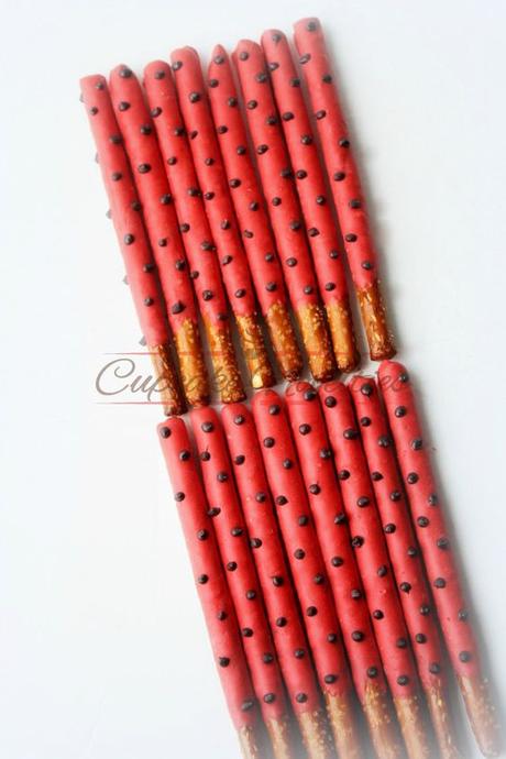Perfect for ladybug themed birthdays, baby showers & spring garden themed parties, these cute red black polka dot ladybug decorated chocolate dipped pretzels make a delicious treat as a dessert or yummy party favors!