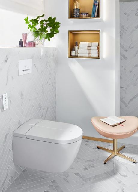 gold and white bathroom