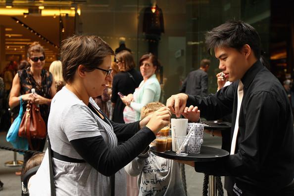 Shoppers in a queue outside Zara are offered espresso coffee as  the doors open to its Westfield Pitt Street Mall store on April 20, 2011 in Sydney, Australia. This is the first Australian store opening for the Spanish chain, with the addition of a Melbourne store to be announced.