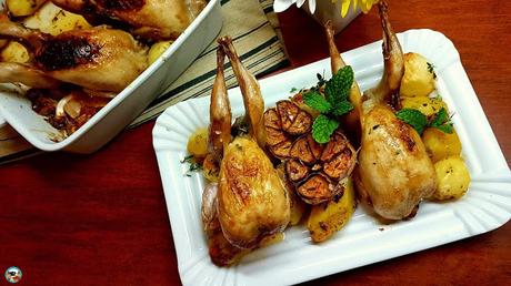 Codornices con papas al ajillo