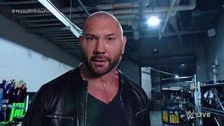 Batista  Reta  a Triple H atacando  a Ric Flair