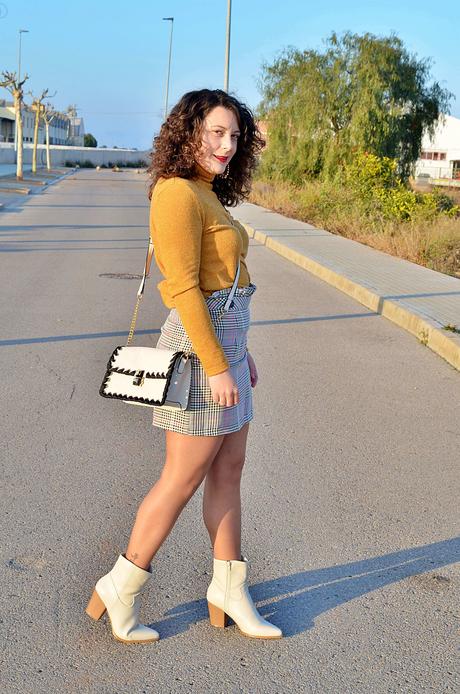 Cómo combinar una falda de cuadros