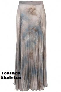 Olivia Palermo, camisa de mango, falda de Topshop, capazo de paja y tan chic!!