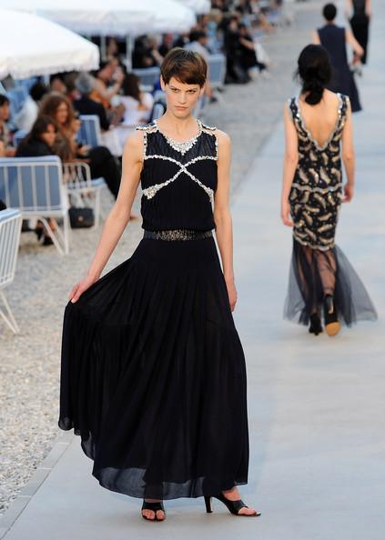 A model walks the runway during the Chanel Collection Croisiere Show 2011-12 at the Hotel du Cap on May 9, 2011 in Cap d'Antibes, France.