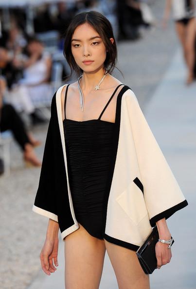 A model walks the runway during the Chanel Collection Croisiere Show 2011-12 at the Hotel du Cap on May 9, 2011 in Cap d'Antibes, France.