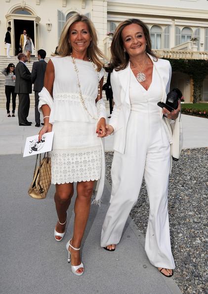 Naty (L) and guest attend the Chanel Collection Croisiere Show 2011-12 at the Hotel du Cap on May 9, 2011 in Cap d'Antibes, France.