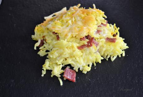 Arroz con cúrcuma jamón y mozarella gratinado al horno