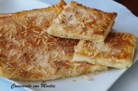 Coca de hojaldre rellena de crema pastelera Coca de hojaldre rellena de crema pastelera