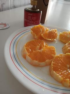 Ensalada de Naranja con miel y aceite de oliva.