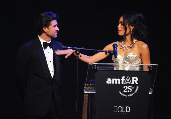 Patrick Dempsey and Rosario Dawson onstage at amfAR's Cinema Against AIDS Gala during the 64th Annual Cannes Film Festival at Hotel Du Cap on May 19, 2011 in Antibes, France.