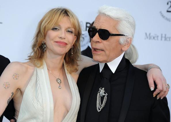 Courtney Love and Karl Lagerfeld attends amfAR's Cinema Against AIDS Gala during the 64th Annual Cannes Film Festival at Hotel Du Cap on May 19, 2011 in Antibes, France.