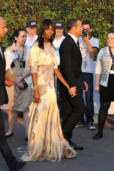 Naomi Campbell and Vladimir Dorondin arriving at the glamorous Hotel Du Cap for the amfAR 2011 Fight Against Aids party.