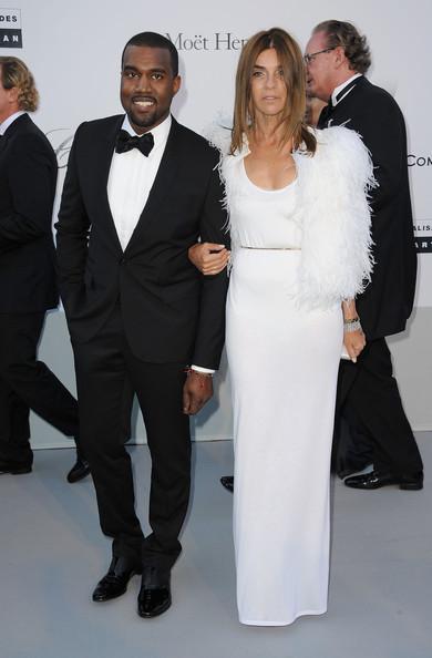 Kanye West and amfAR Chairman Kenneth Cole attend amfAR's Cinema Against AIDS Gala during the 64th Annual Cannes Film Festival at Hotel Du Cap on May 19, 2011 in Antibes, France.