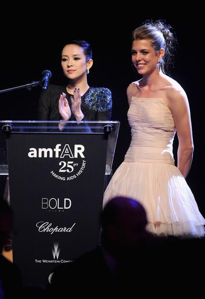 Zhang Ziyi and Charlotte Casiraghi onstage at amfAR's Cinema Against AIDS Gala during the 64th Annual Cannes Film Festival at Hotel Du Cap on May 19, 2011 in Antibes, France.