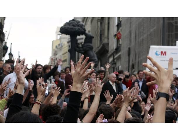 Demonstrators gather at Madrid's famous landmark Puerta del Sol