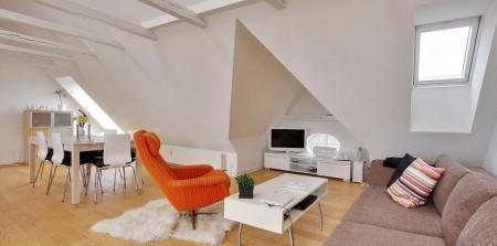 muebles de diseño mecedora eames blanca estilo nórdico diseño de interiores diseño danés decoración en blanco decoración de interiores cocina salón diáfano cocina moderna cocina blanca ático estilo nórdico ático estilo escandinavo 