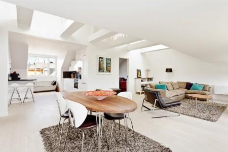 vigas en el techo ventanas redondas muebles nórdicos inspiración áticos fotografías áticos diseño nórdico diseño escandinavo decoración en blanco decoración áticos cocinas modernas cocinas blancas baño moderno baño de diseño ático estilo nórdico 