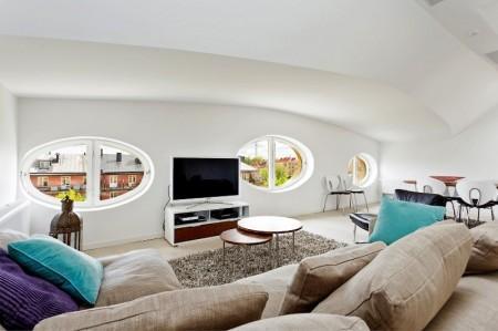 vigas en el techo ventanas redondas muebles nórdicos inspiración áticos fotografías áticos diseño nórdico diseño escandinavo decoración en blanco decoración áticos cocinas modernas cocinas blancas baño moderno baño de diseño ático estilo nórdico 