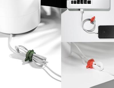 Mantén colocados tus cables con la ayuda de estos dinosaurios