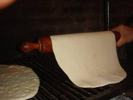 Foto del paso 10 de la receta Pizza a la parrilla con pollo y champiñones
