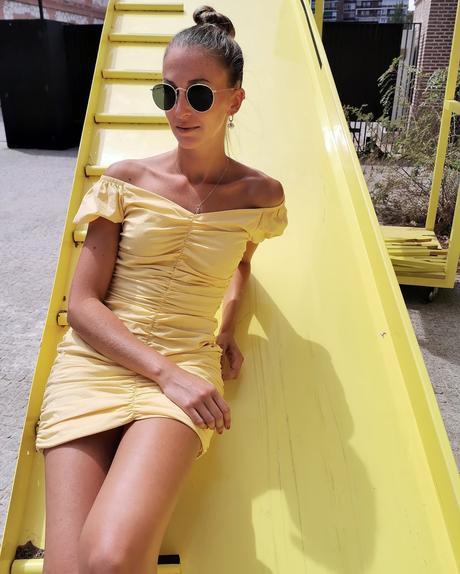 Yellow drapped dress