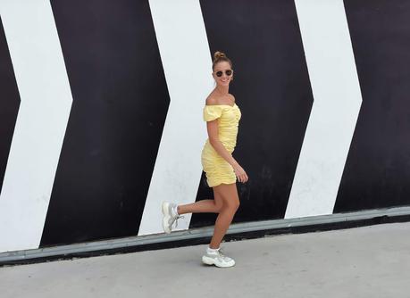 Yellow drapped dress