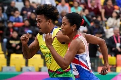 Omara Durand, viva expresión de voluntad y maestría deportiva. Yuniol Kindelán, su guía, la complementa.