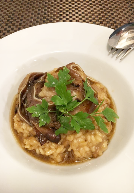 Arroz meloso de boletus con oreja de cerdo guisada