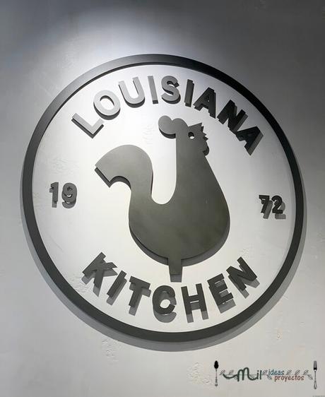 logo original restaurante popeyes interior restaurante popeyes en Madrid