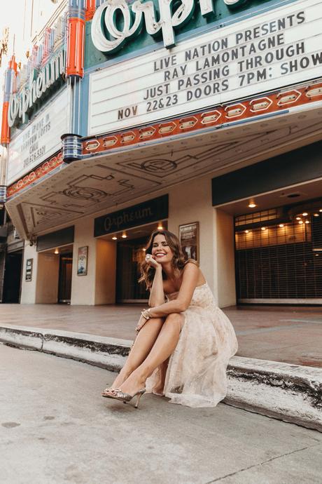 Party outfit wearing a Champagne tulle dress and Manolo Blahnik sandals