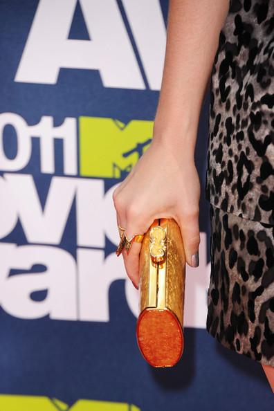 Actress Lily Collins arrives at the 2011 MTV Movie Awards at Universal Studios' Gibson Amphitheatre on June 5, 2011 in Universal City, California.