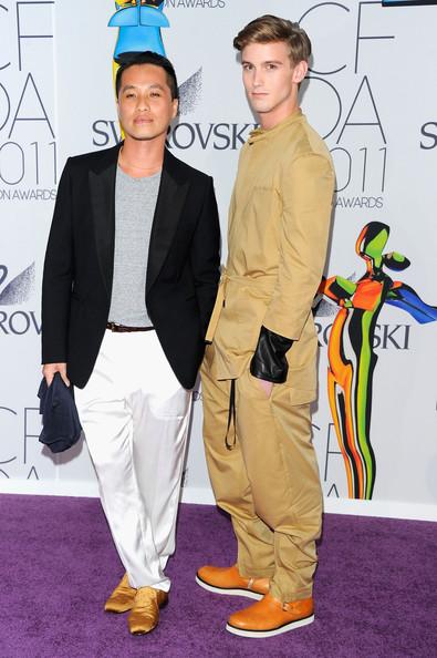 Designer Philip Lim(L) and guest attend the 2011 CFDA Fashion Awards at Alice Tully Hall, Lincoln Center on June 6, 2011 in New York City.